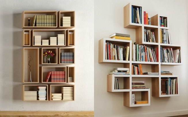 Organizar seus livros em nichos nas paredes é uma alternativa às estantes de livros tradicionais